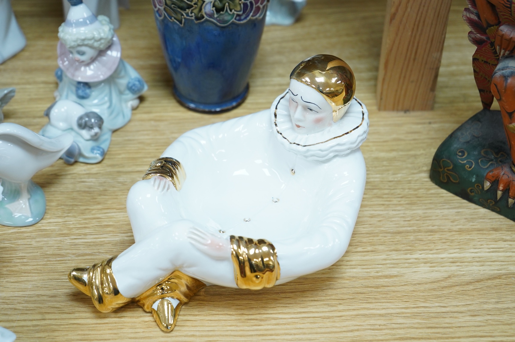 Two Doulton vases, a Casa Pupo pierrot dish and a collection of nine Lladro figures, largest 27cm high